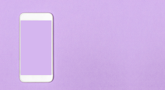 Purple screen white smart phone on the purple background. For app or web site presentation. Product mock up.