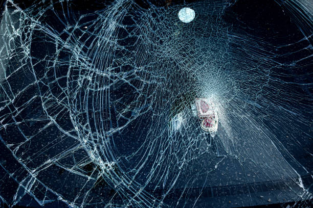 istock Cracked glass from car crash accidental with selective focusing 1210131037