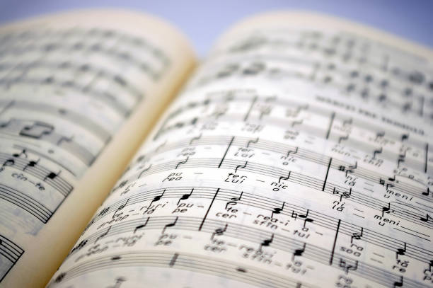 istock closeup of musical notes on a music book. 1210132186