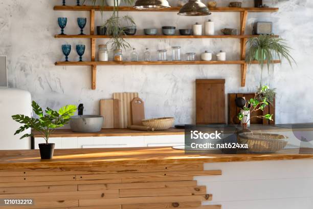 Spacious Loft Industrial Open Space Kitchen Studio Interior With Kitchen Appliances And Sink Stock Photo - Download Image Now