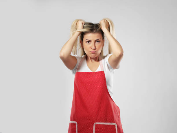 istock Frustrated housewife 1210133194