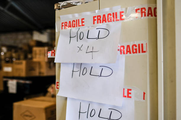 istock Fragile packaging tape seen on a large card board box, seen prior to shipment. 1210134714