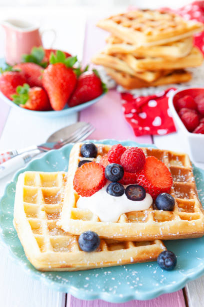 istock Homemade waffles with fresh fruits 1210135743