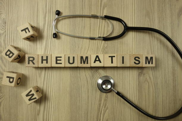 istock Word rheumatism from wooden blocks with stethoscope 1210136077