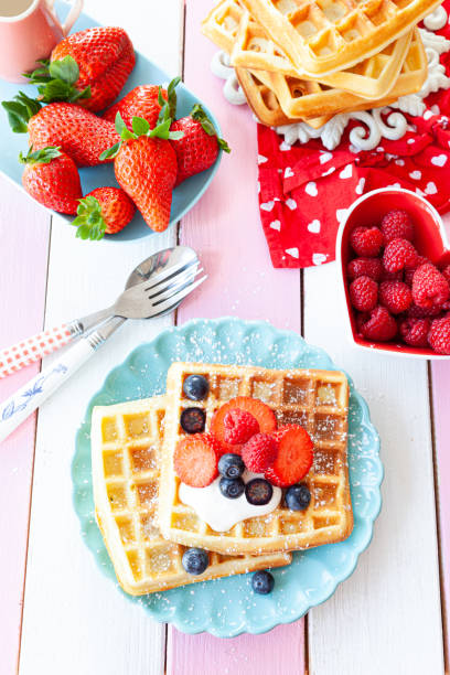 istock Homemade waffles with fresh fruits 1210136845