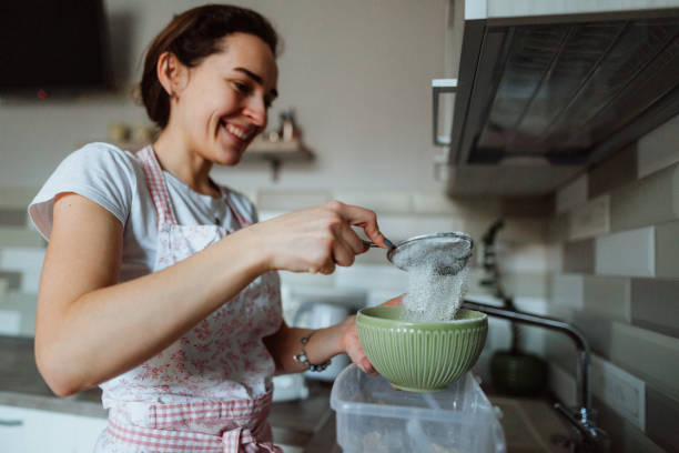 istock Woman is cooking in domestic kitchen 1210137908