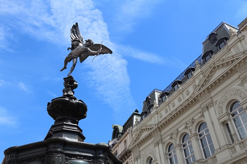 Charles I Monument (cast in 1633 by Hubert Le Sueur and erected in this position in 1675) and Nelson's Column (built by 1843 to a design by William Railton).