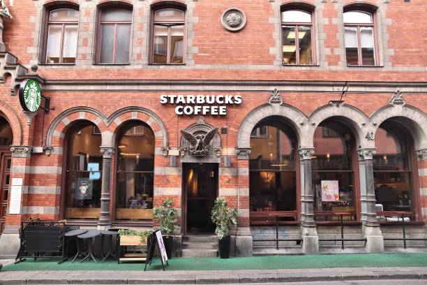 Starbucks Coffee Sweden Starbucks Coffee in Gotgatan street of Sodermalm district, Stockholm. Gotgatan is one of most recognizable streets in Sodermalm. sodermalm photos stock pictures, royalty-free photos & images