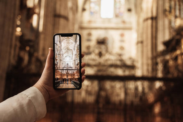 istock Taking a picture with a smartphone inside a catholic cathedral 1210144659