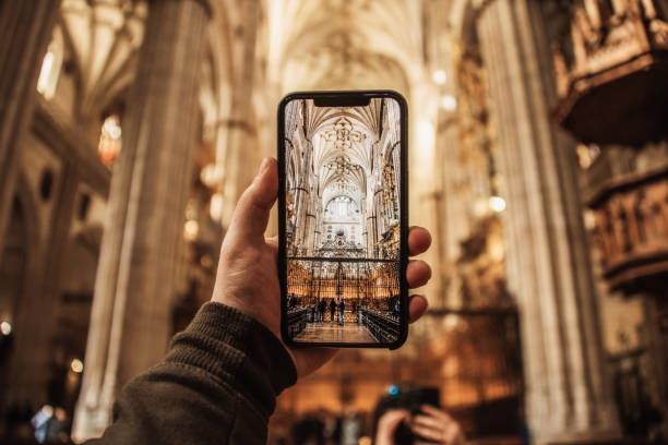 istock Taking a picture with a smartphone inside a catholic cathedral 1210145017