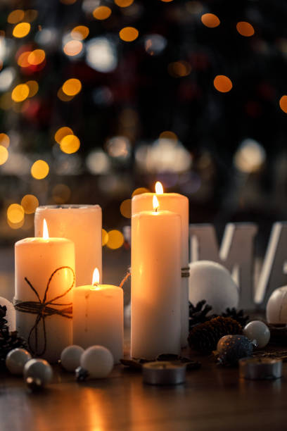 istock White candles for a peaceful Christmas season 1210145244