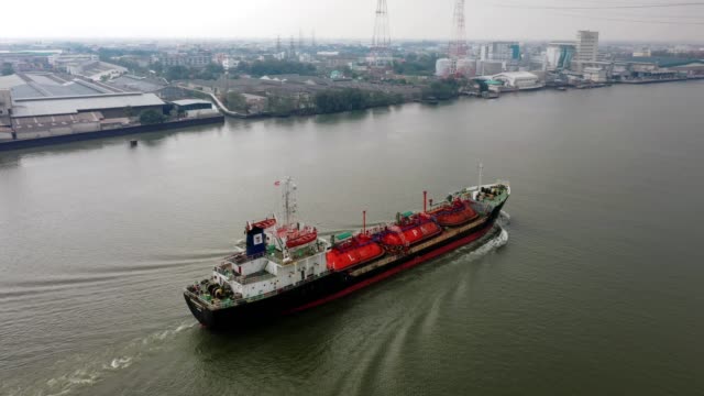 Aerial view Liquefied Petroleum Gas (LPG) tanker, Tanker ship logistic and transportation business oil and gas industry on river