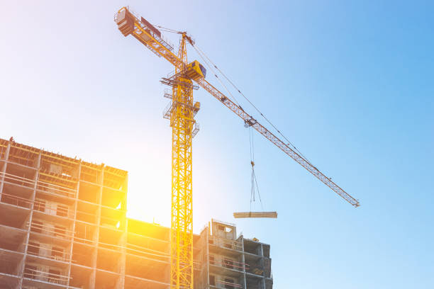 istock Construction cranes and new Residential complex real estate 1210146553