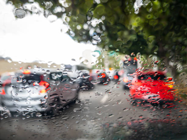 istock Traffic and rain on the car glass. 1210147160