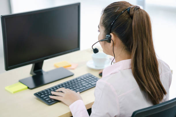 istock Business People Group Working In Customer And Help Desk Office 1210148088