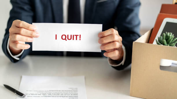 istock Stressful businessman quit a job with resignation letter. 1210152009