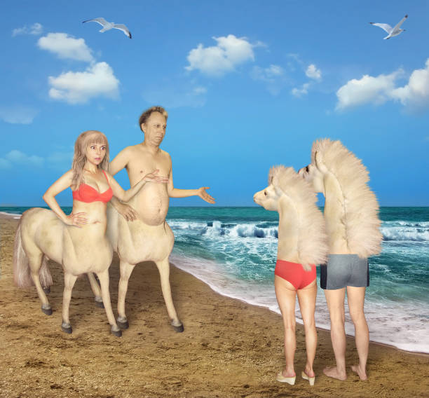 Two centaurs meet strange horses The couple of centaurs meets the strange horse on the beach of the sea. They were very confused. unusual couple stock pictures, royalty-free photos & images