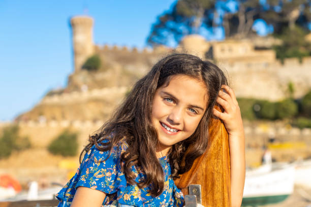 Portrait of a beautiful girl with long hair Portrait of a beautiful girl with long hair tossa de mar stock pictures, royalty-free photos & images