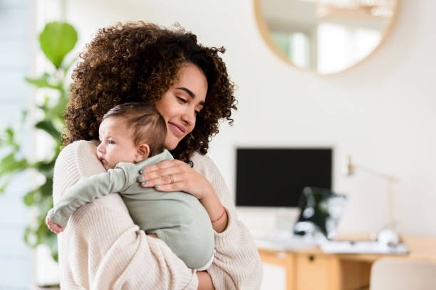 istock Young woman enjoys time with her baby 1210165402