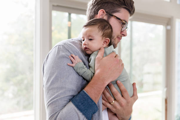 istock A new dad cares for his infant son 1210165428