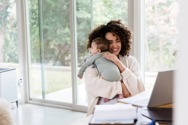 istock Working mom cares for infant son 1210165440