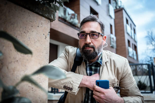 istock Mature Detective walking in the city 1210165764