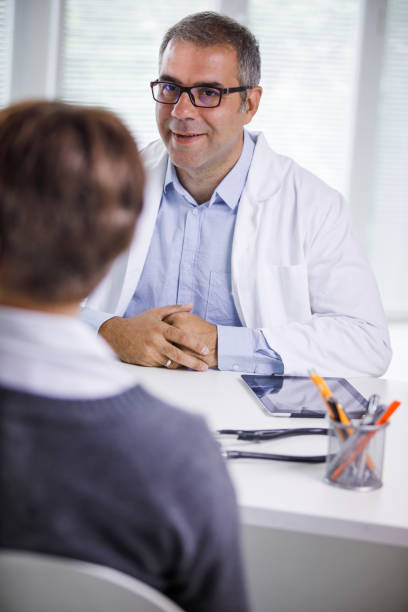 istock Positive attitude helps this doctor during his consultation sessions 1210167344