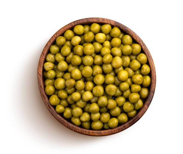 istock Canned green peas isolated on white background, top view 1210170693