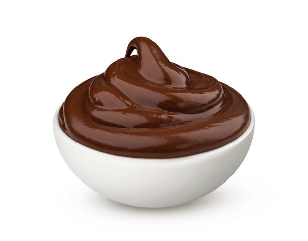 istock Bowl of chocolate cream isolated on white background 1210171019