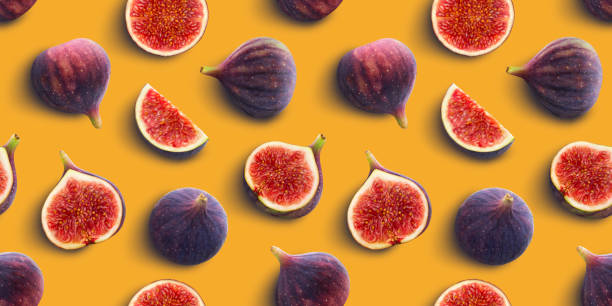 istock Fresh figs seamless pattern on yellow color background, flat lay, top view 1210171076