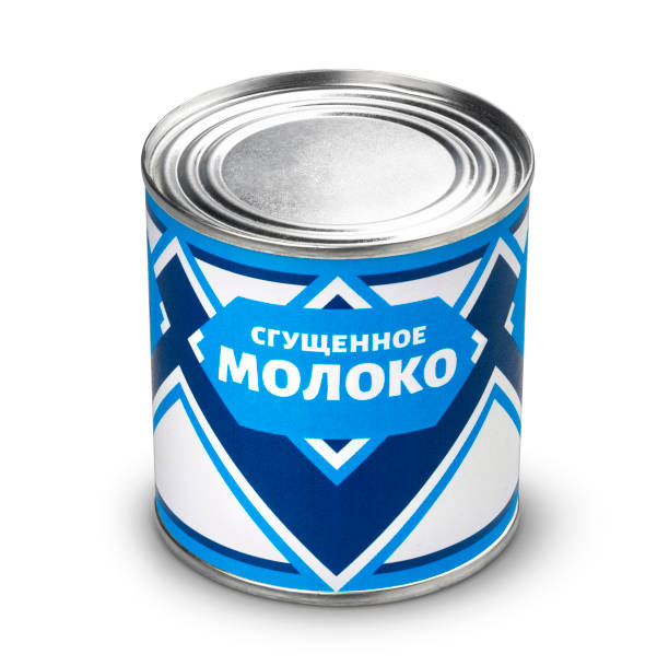 Condensed milk can isolated on white background, russian cyrillic text