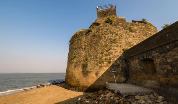 Diu #5 Diu, India - December 2018: The exterior ramparts and facade of the colonial architecture of the Portuguese era fort in Diu Island. diu island stock pictures, royalty-free photos & images