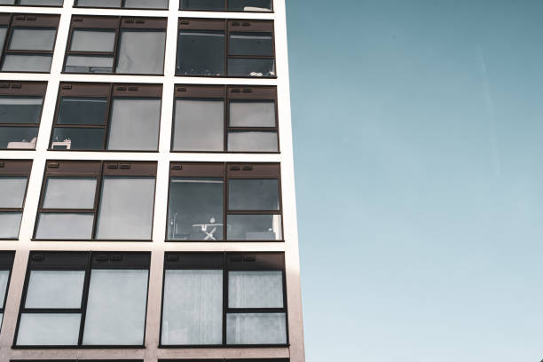 Facade of an apartment building against a clear sky.  Belfast, Northern Ireland.