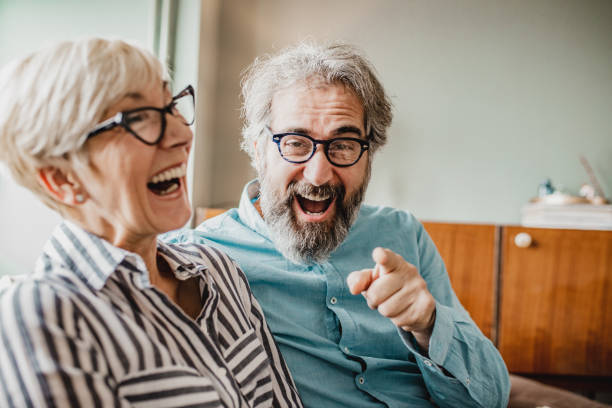 istock Loving senior couple at home 1210175863