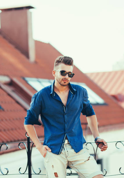 istock Man wearing summer shirt 1210178143