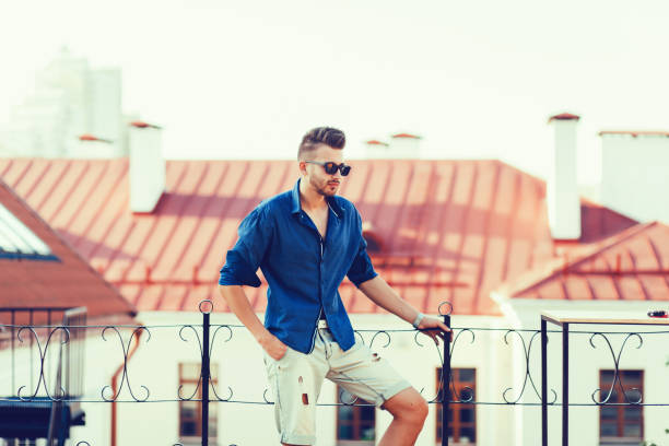 istock Young handsome man in summer clothes 1210178168
