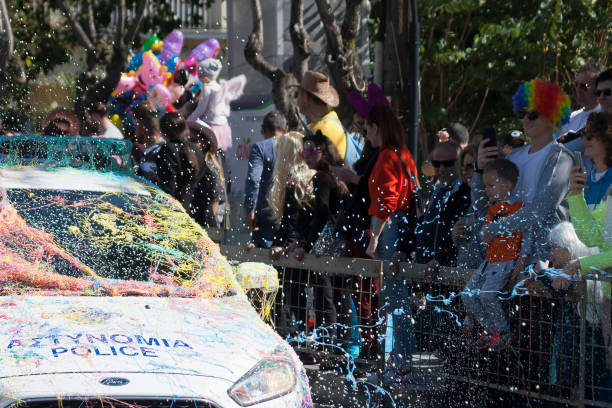 Limassol, Cyprus, March 1st, 2020: Police car sprayed with silly strings moving along Archbishop Makarios III Avenue during the Grand Parade of the Annual Limassol Carnival Festival