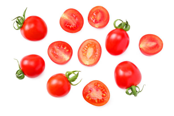 istock fresh tomato with slices isolated on white background. top view 1210179889