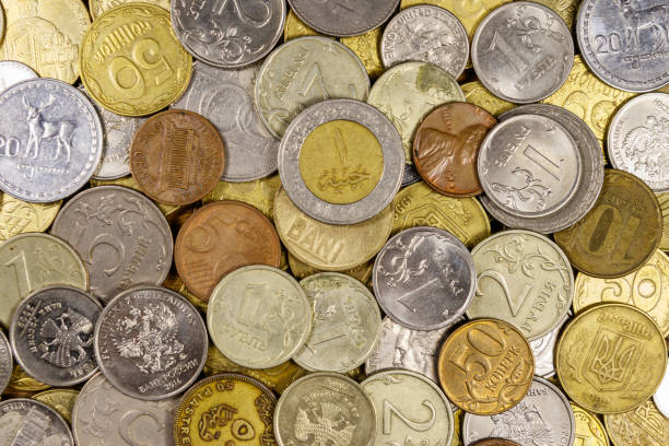 istock Background of various coins from different countries 1210180392