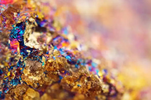 Non-ferrous metal. Nugget. Gold.Copper. Iron. Macro. Colorful background.