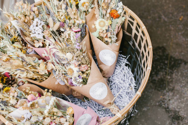 istock Dried herbs bunches in basket. 1210181605