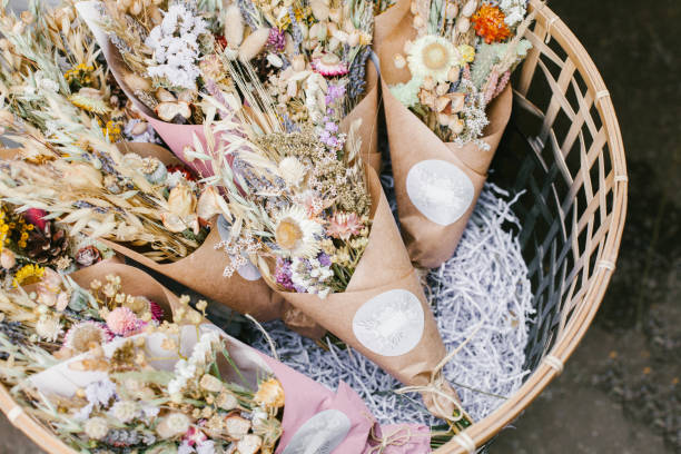 istock Dried herbs bunches in basket. 1210181642