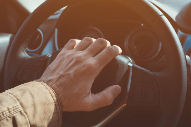 istock Honking the car horn in traffic jam 1210182553