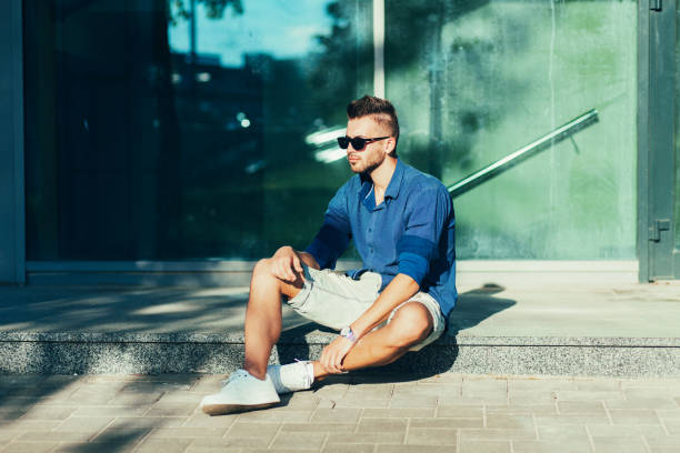 istock handsome man in blue shirt 1210183526