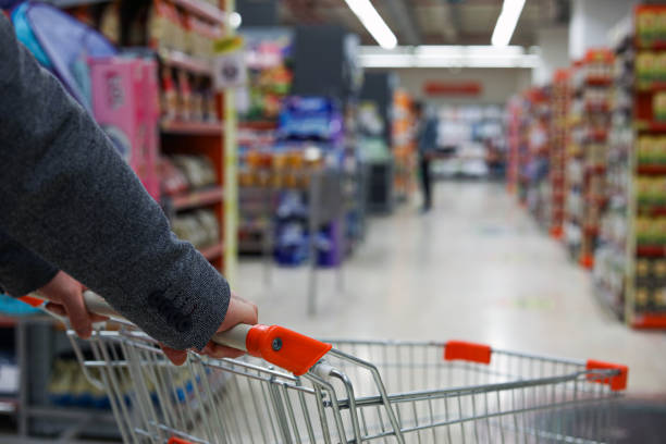 istock Shopping Man and Market Basket 1210183874
