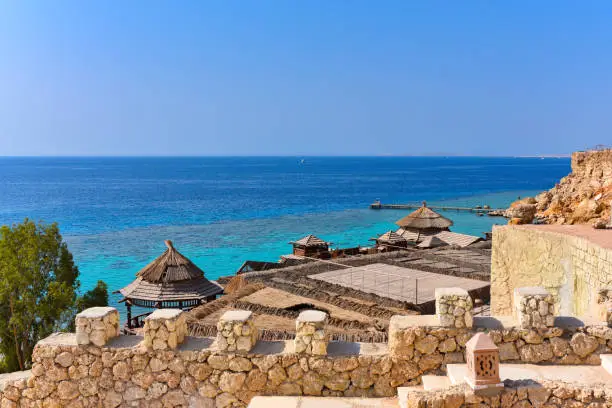 Photo of The rocky beach of the Red Sea Hotel in Sharm El Sheikh in Egypt