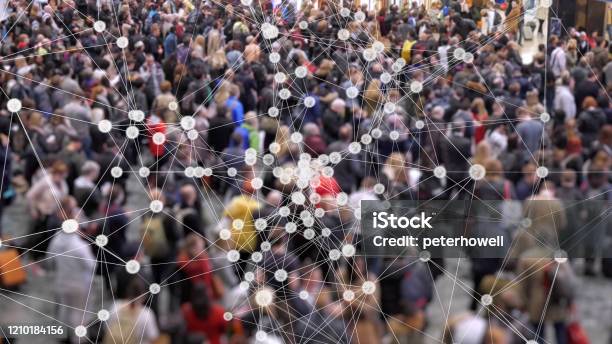 Coronavirus Particles Spreading In A Crowd Of People Stock Photo - Download Image Now