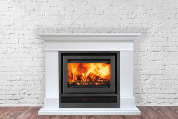 istock White Fireplace in bright empty living room interior of house 1210187809