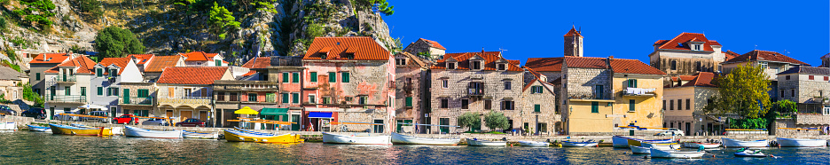 beautiful colorful town Omis , surrounded by impressive mountains. Dalmatia, Croatia