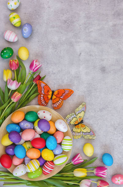 istock Easter Background with Colorful Eggs and Tulips 1210191691